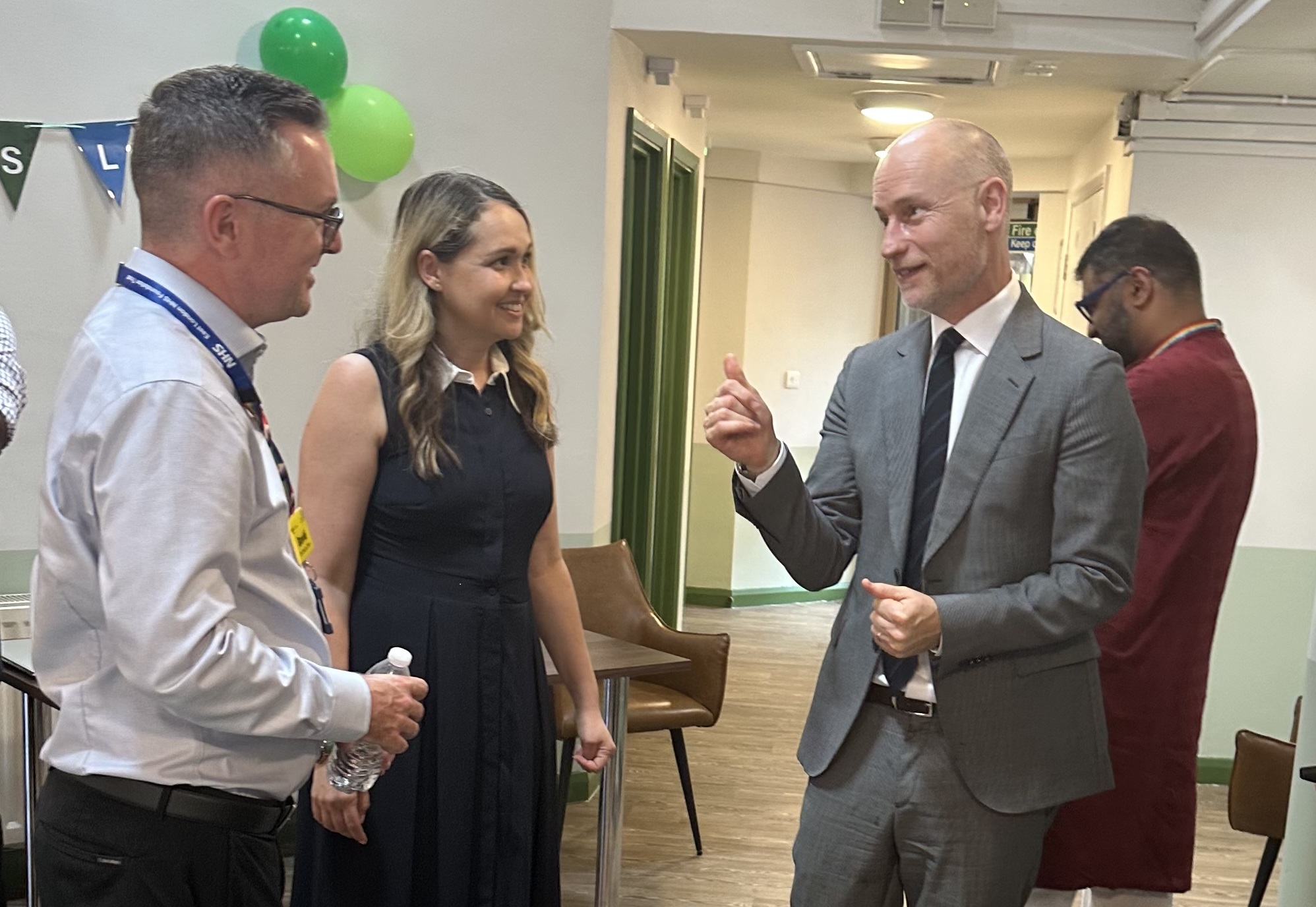 Two NHS staff members speak to Care Minister Stephen Kinnock.