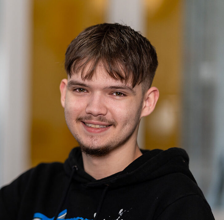 A service user smiling