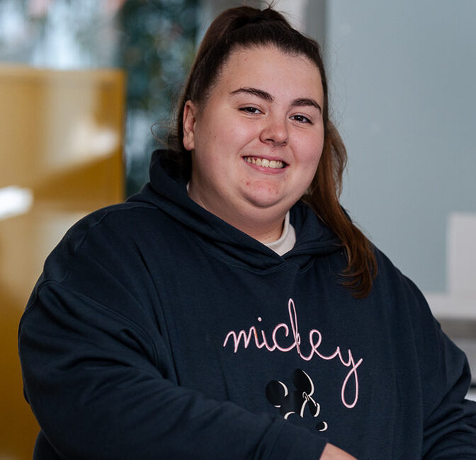 A service user cooking in a kitchen