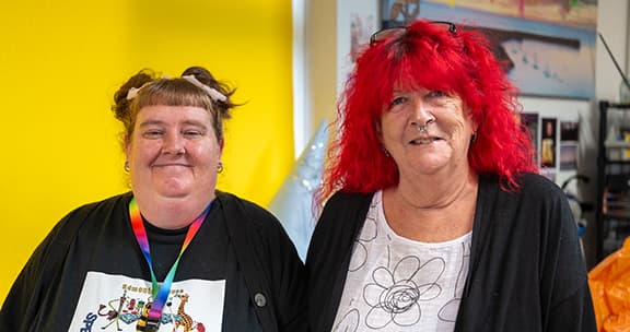 Look Ahead staff with customer